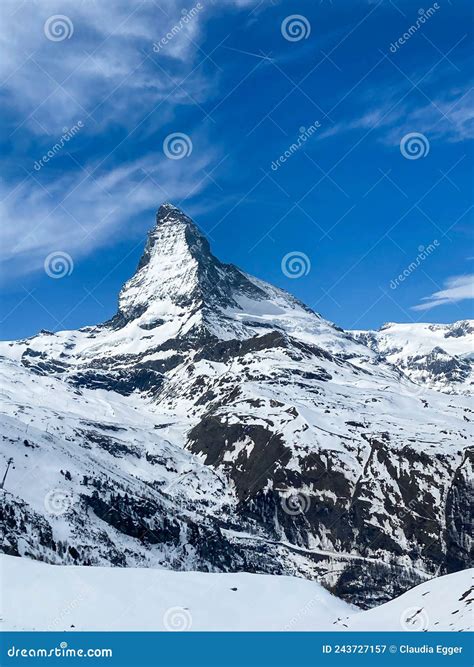 Impressive View In Cloudy Sky To The Matterhorn Mountain In Switzerland