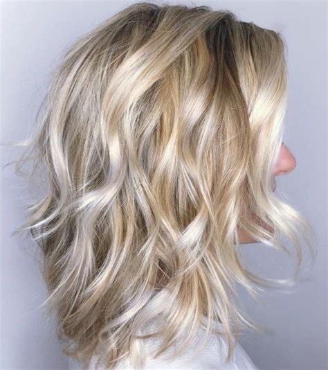 14 spectacular current modern hairstyles for women with long wavy hair