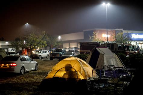 In A Walmart Parking Lot A Tent City Of Camp Fire Refugees Takes