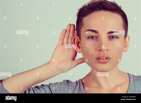 Closeup Portrait Young Nosy Woman Hand To Ear Gesture Carefully