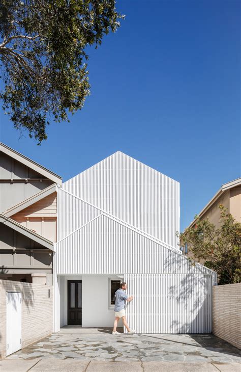 James Garvan Architecture Adds White Gabled Screens To Bondi Home In