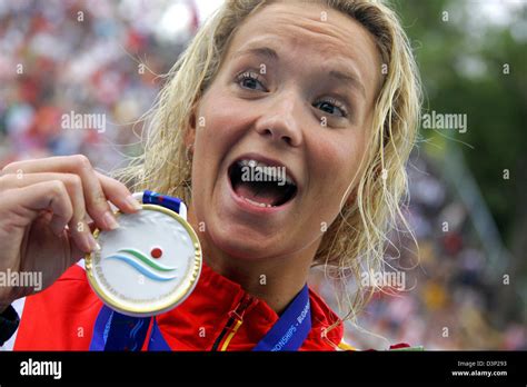 german swimmer janine pietsch shows her medal after her victory in the 50 m women s backstroke