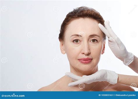 Middle Age Woman Getting Spa Treatment Face Massage Anti Aging Botox And Collagen Stock Image