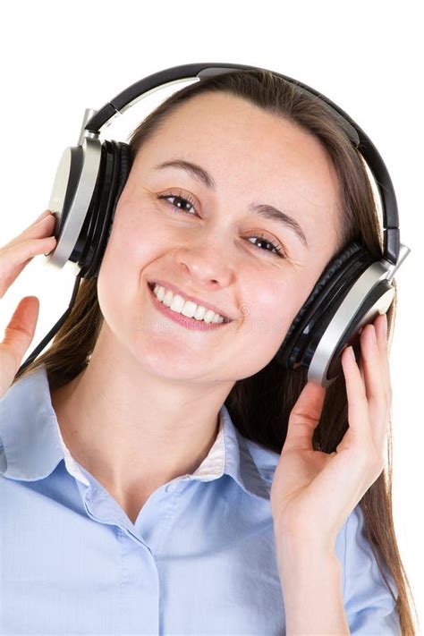 Woman Listening To Music On Headphones Enjoying And Singing Stock Image