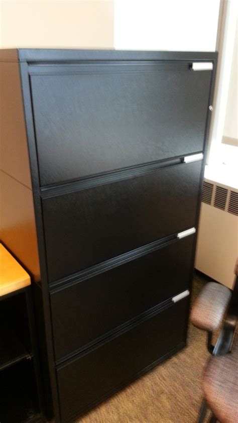 This one is charcoal in color, but we have them in grey and in putty, all letter size. Meridian Black 4 Drawer Lateral File Cabinet Locking 36 x ...