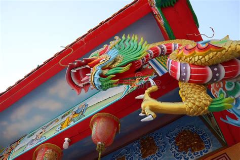 Close Up Of Colorful Stucco Dragons Decorated At Chinese Temple Pillars