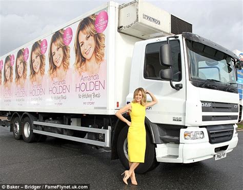 Amanda Holden Fills Lorry Up In Sexy Yellow Dress As She Delivers Her