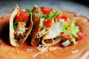 Slice chicken into thin strips approximately 3 inches long and set them in a flat glass baking dish. food of mexico