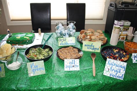 A spa style retirement party. Golf themed food =) Food cards on plaid, grass, and golf ...