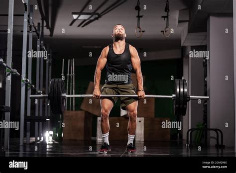 Muscular Athlete Lifting Very Heavy Barbell Stock Photo Alamy