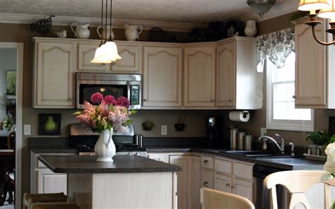 Hey guys,i promised and here it is. Ideas for decorating the top of kitchen cabinets