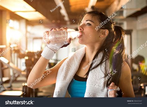 Young Athletic Woman Drinking Water Gym Stock Photo