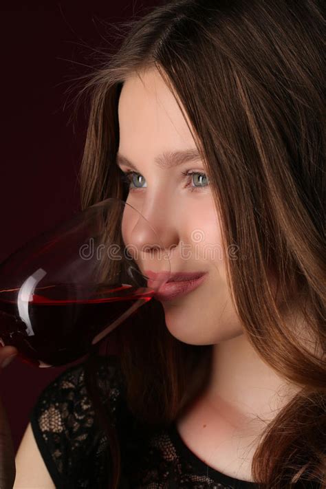 Model Drinking Milk From A Wine Glass Close Up Gray Background Stock