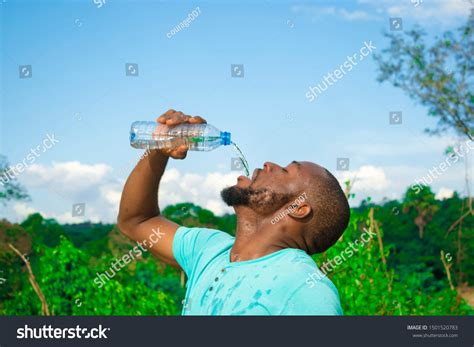 Young Black Man Drinking Water Bottle Stock Photo 1501520783 Shutterstock