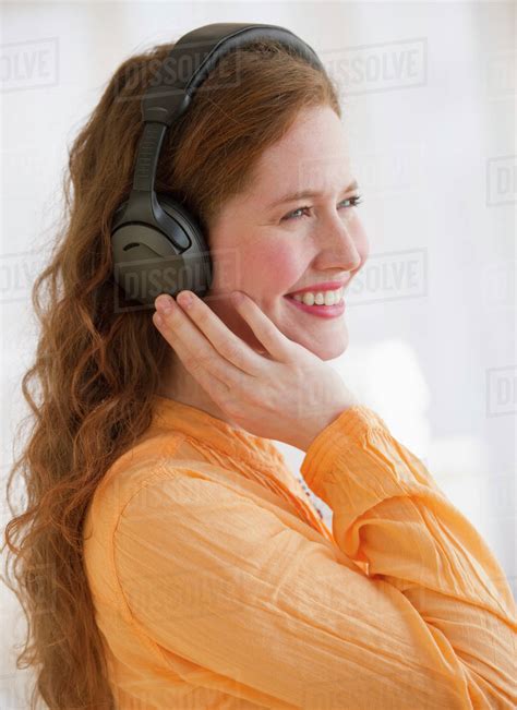 Woman Wearing Headphones Stock Photo Dissolve