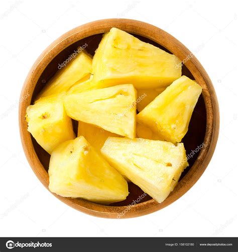 Pineapple Pieces In Wooden Bowl Over White Stock Photo By ©furian 158102180