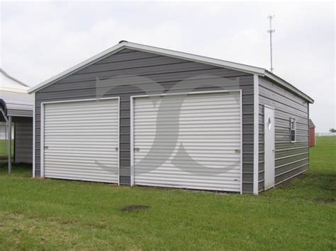 Offering metal garages and steel buildings for sale. Enclosed Metal Garage | Vertical Roof | 22W x 26L x 9H | 2 ...