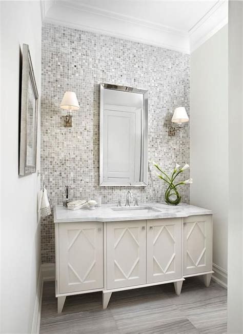 A bathroom accent wall has different requirements than a bedroom or living room accent wall. White and gray bathroom features a gray mosaic tiled ...
