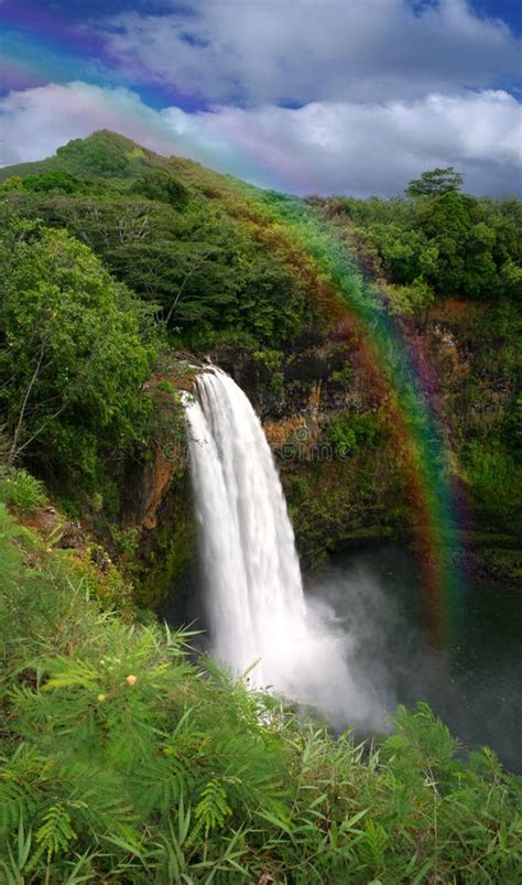 Waterfall In Kauai Hawaii With Rainbow Stock Image Image Of Lush