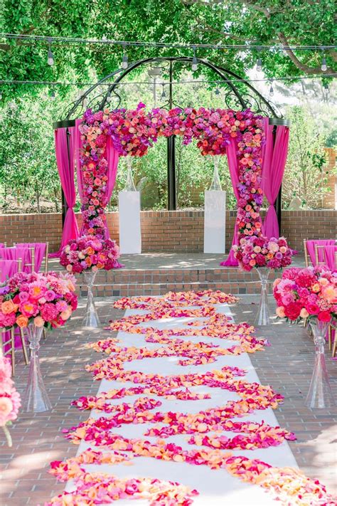 hot pink wedding ceremony flowers hot pink wedding flowers hot pink weddings pink wedding theme