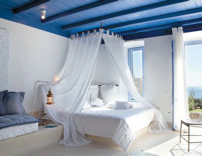 There are numerous ways you can achieve this mediterranean inspired look in your bedroom without spending a lot of money. Greek Decor Style in White and Blue at Mykonos Blue Resort | Greek bedroom, Romantic bedroom ...