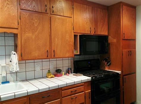 Properly refinishing wooden cabinets is a very time intensive and strenuous task. Pin by Rebecca Trumbo on Before Renovation | Kitchen ...