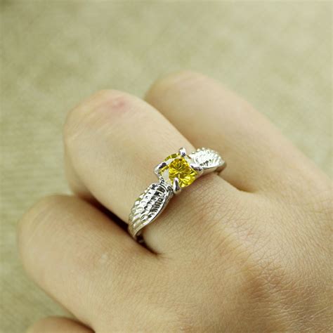 Https://tommynaija.com/wedding/golden Snitch Wedding Ring