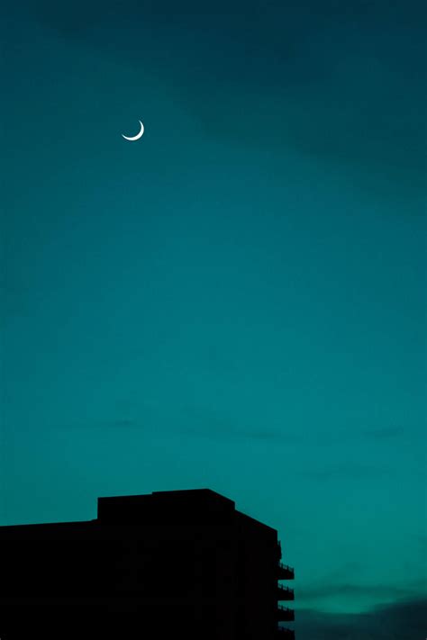 Download Moon And Teal Sky Wallpaper