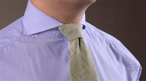 The wide end a should extend about 12 inches below the narrow end b. How to Tie A Half Windsor Knot