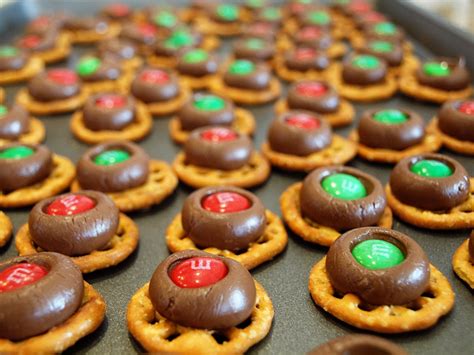 Pin this christmas pretzel kiss recipe unwrap hershey's kisses and place one in the center of each pretzel. Mama Schell Says: Buttons - A Kid-Friendly Holiday Recipe