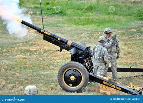 Us Army Artillery Crew Firing A Cannon Editorial Image Image Of