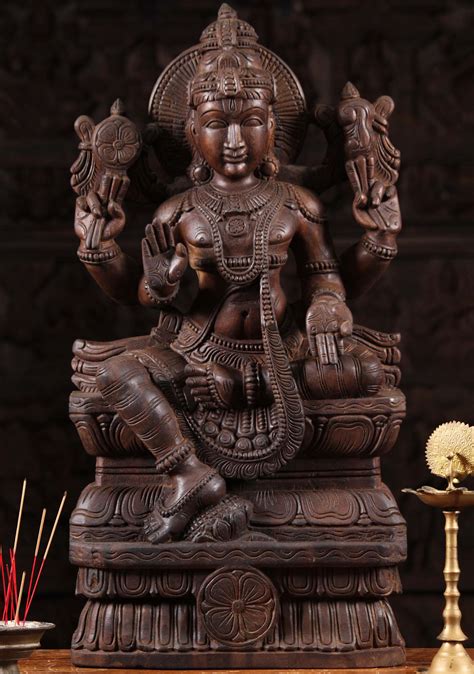 Sold Wood Statue Of The Hindu God Of Preservation Vishnu Seated In The