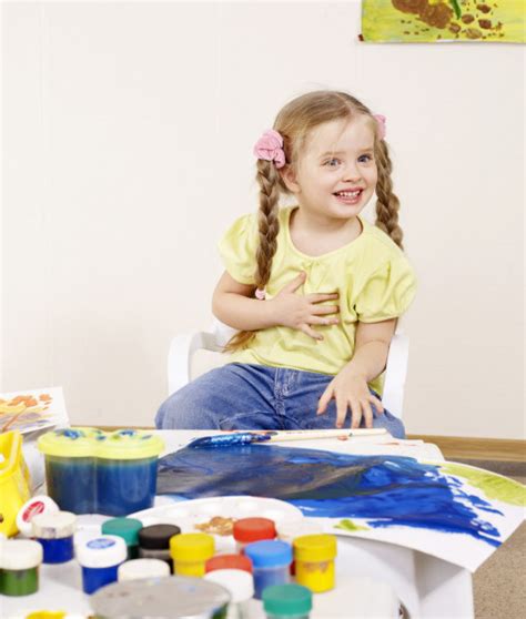 Child Paint Picture In Preschool Stock Photo By ©poznyakov 5188239