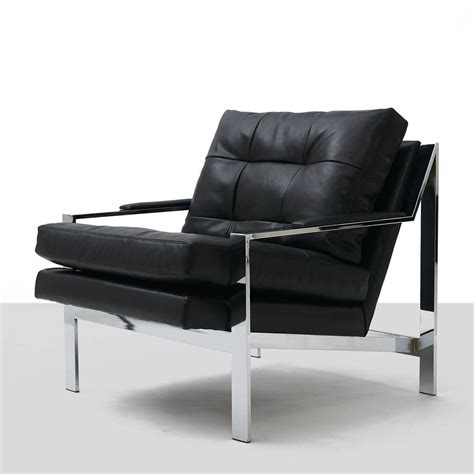 Modern lounge chairs to suit any sit. Pair of Black Leather and Chrome Lounge Chairs at 1stdibs