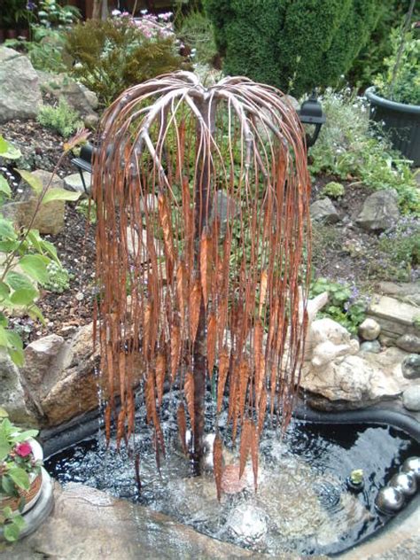 According to baker, the willow droops as. Copper Weeping Willow Tree | Garden Water Features