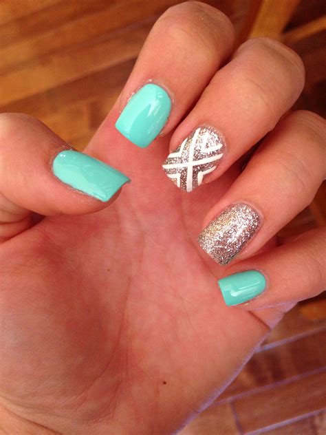 Where to put rhinestones on a teal nail? Summer nails, teal and sparkly | Teal acrylic nails, Teal ...