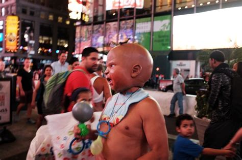 Women Go Topless For Tips In Times Square Photos