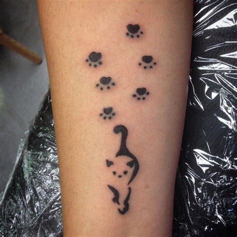 Pin By Lauren Brown On Tattoos Cat Paw Print Tattoo Pawprint Tattoo