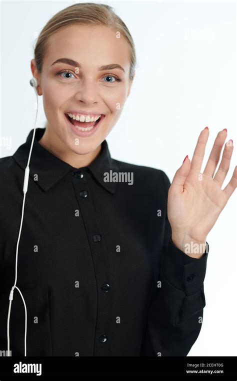 Young Woman Say Hello With Hand Up Isolated On Studio Background Stock