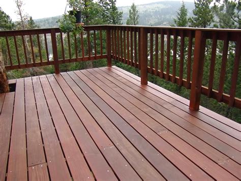 The random designs on each plank of wood or other material you use will look nice and intriguing. Wood Deck Railing Images | Home Design Ideas