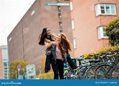 Two Women Having Fun Outside Stock Image Image Of Ethnic City