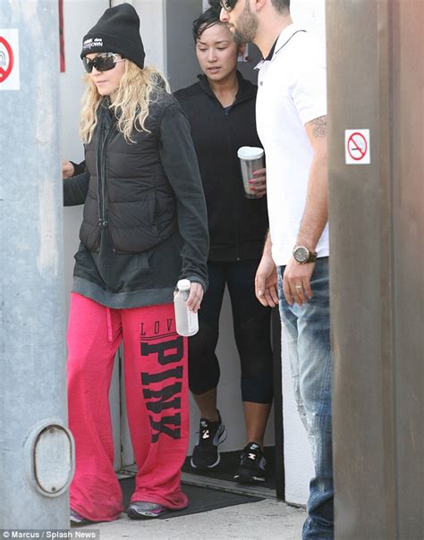 Madonna Steps Out In Comme Des Fdown Beanie After Pilates Session