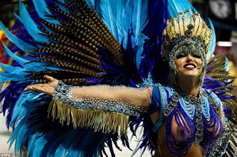 a samba dancer takes part in a parade at anhembi sambadrome as part of the carnival celebrations