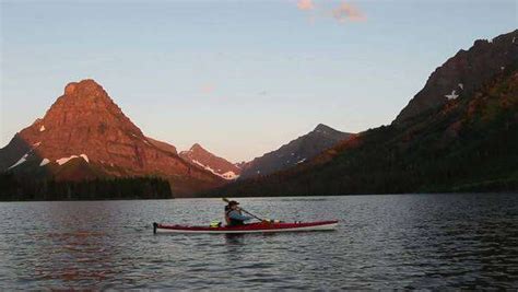 Sea Kayaking In Two Medicine Lake In Glacier National Park Montana