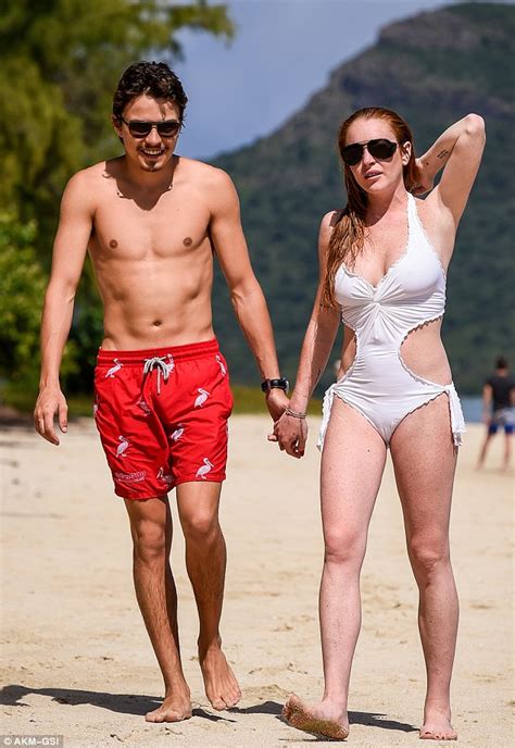 lindsay lohan sports swimsuit during mauritius romp with fiancé egor tarabasov daily mail online