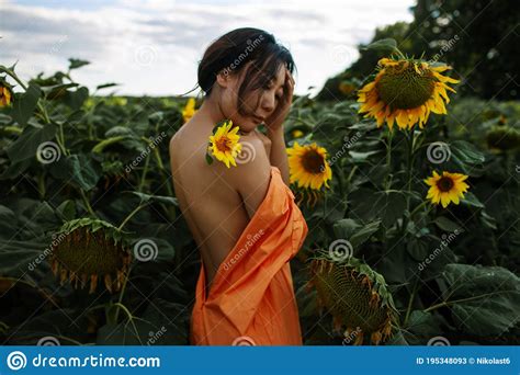 Beautiful Woman With Healthy Back And Health Skin In Sunflower Field Stock Image Image Of