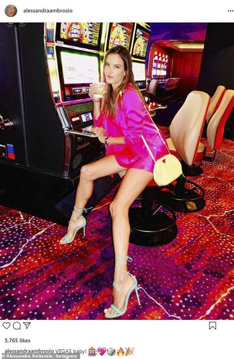 Alessandra Ambrosio Flashes Her Knockout Legs As She Enjoys A Cocktail