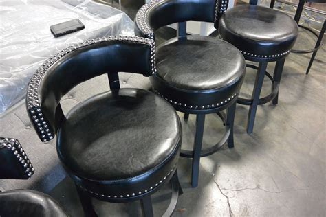 Set Of Four New Black Studded Leather Swivel Bar Stools