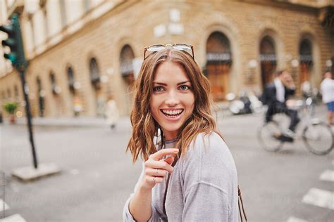 Portrait Of Beautiful Woman Smiling In The City By Stocksy Contributor Aila Images Stocksy