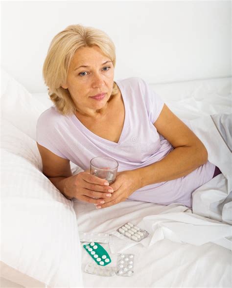 Mature Woman Laying Bed Pills Stock Photos Free Royalty Free Stock